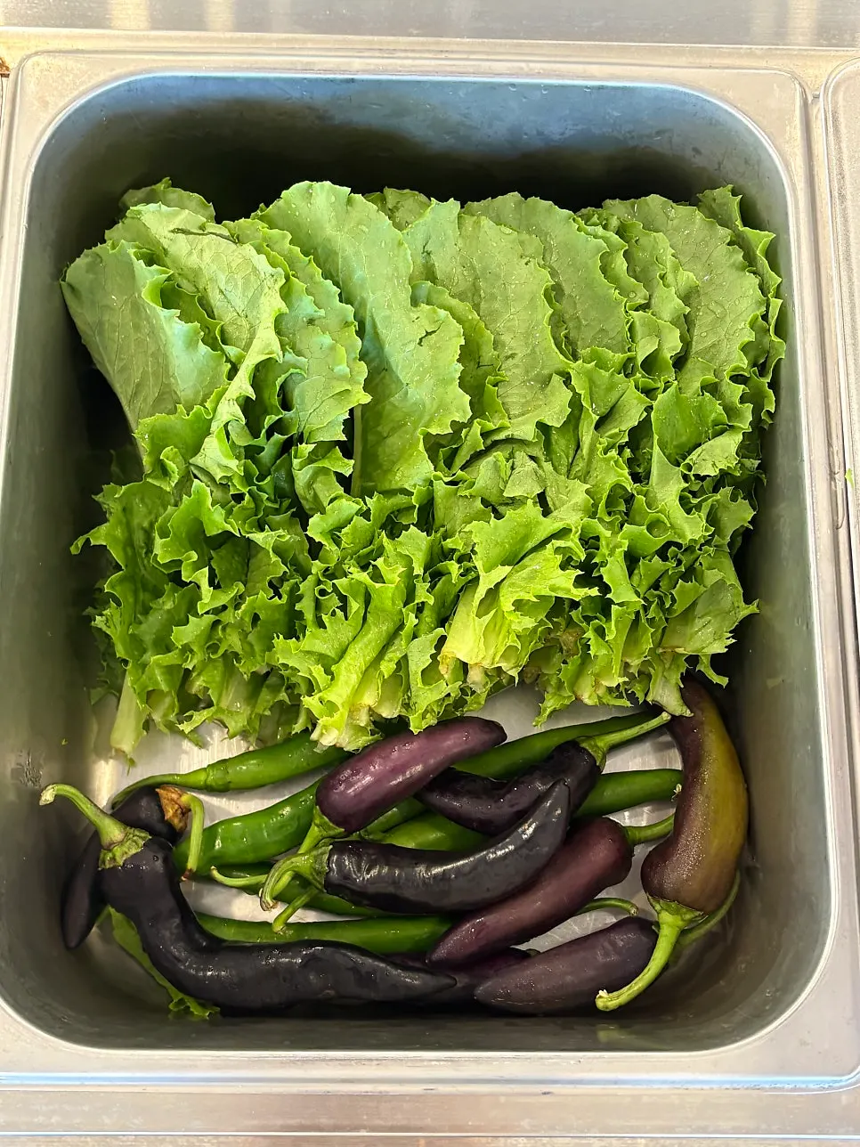 Sauce and side dishes at the self-serve corner