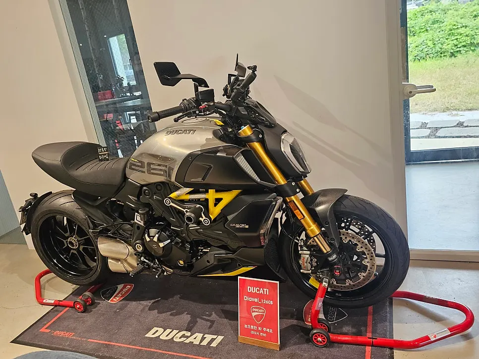 Motorcycle parked at the café entrance