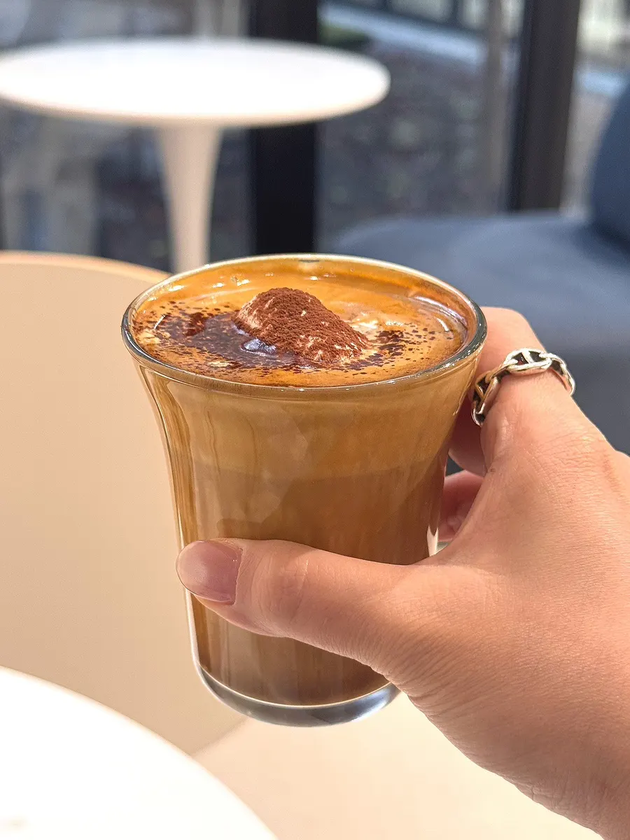 Cafe Imchori's signature coffee topped with cream