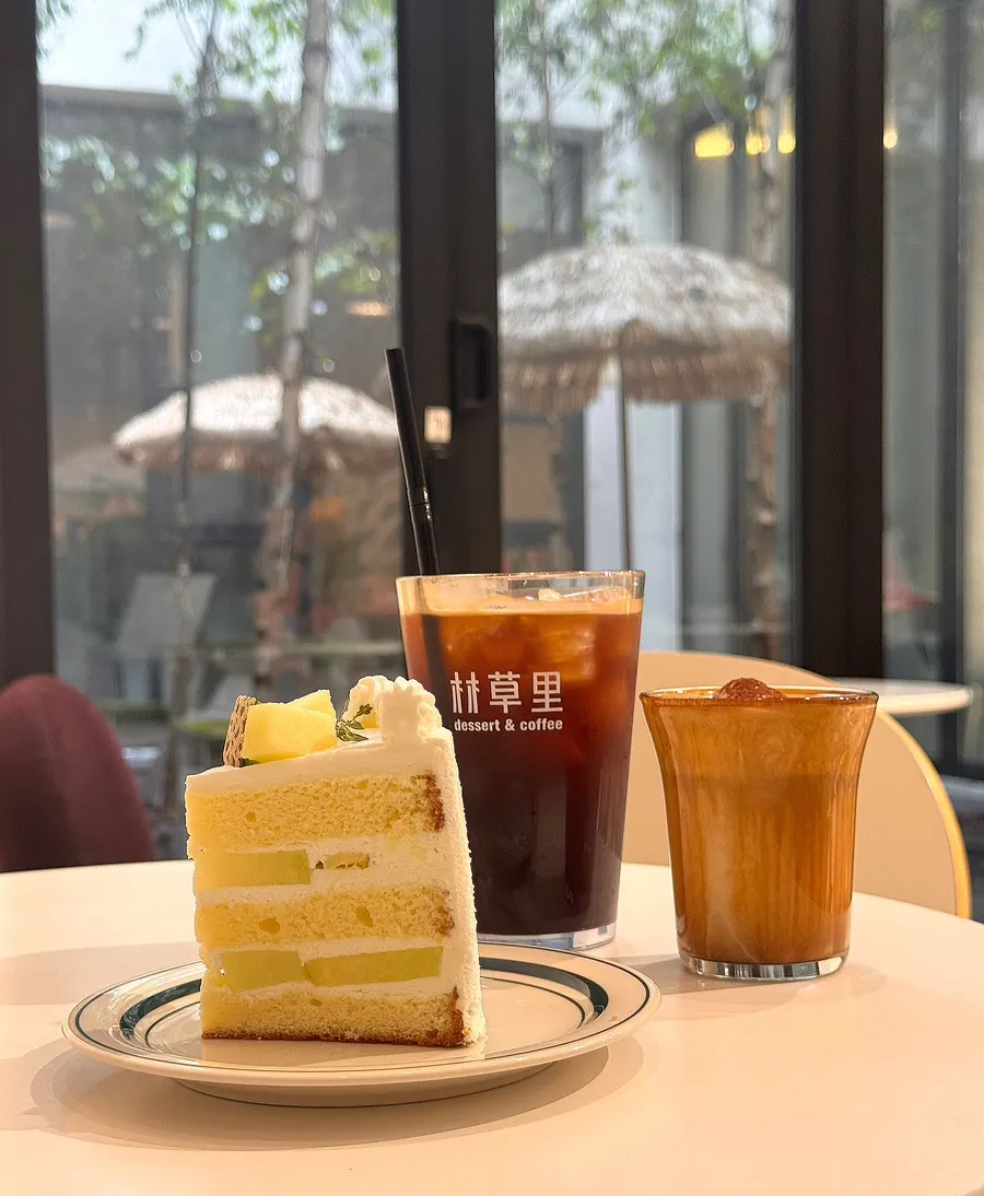Table setting with desserts and coffee at Cafe Imchori