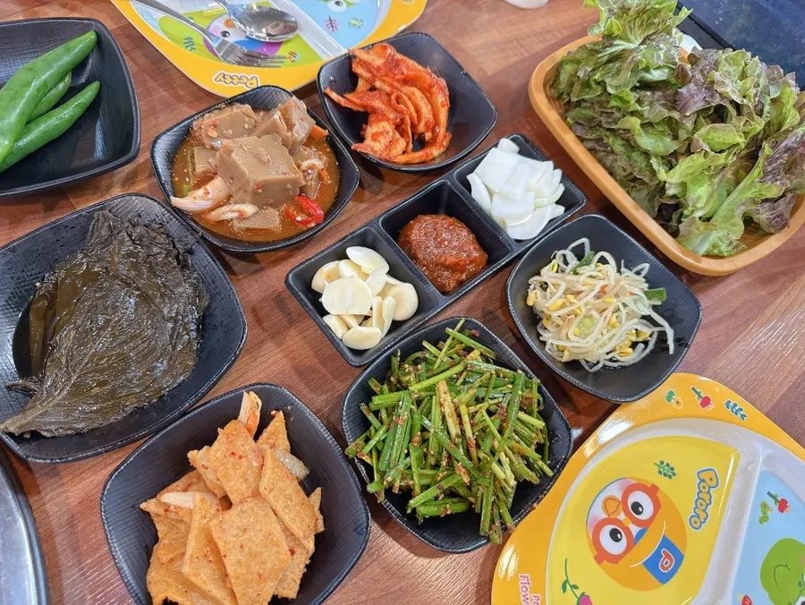 Table spread with banchan side dishes