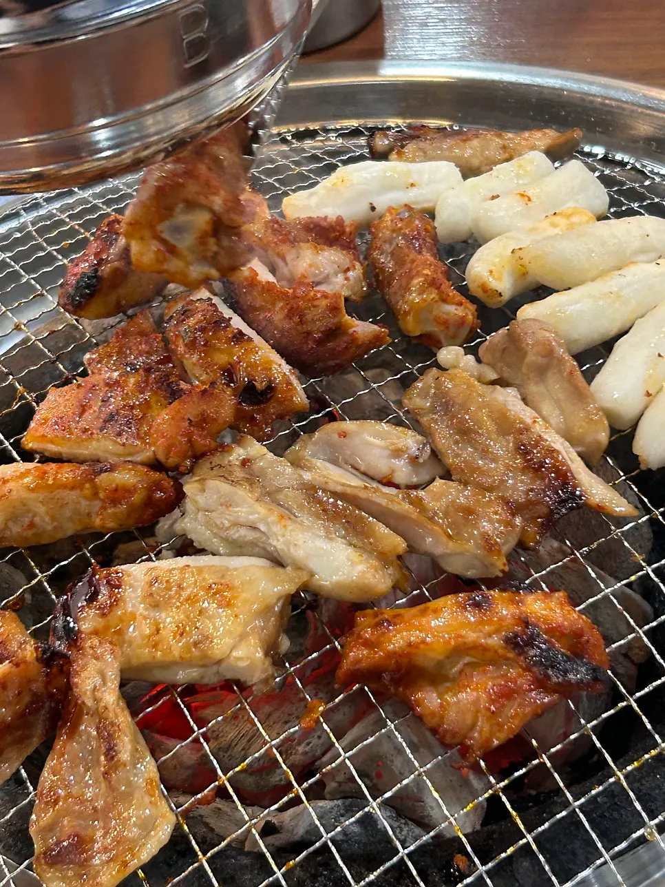 Rice cake skewers grilled together with the dakgalbi