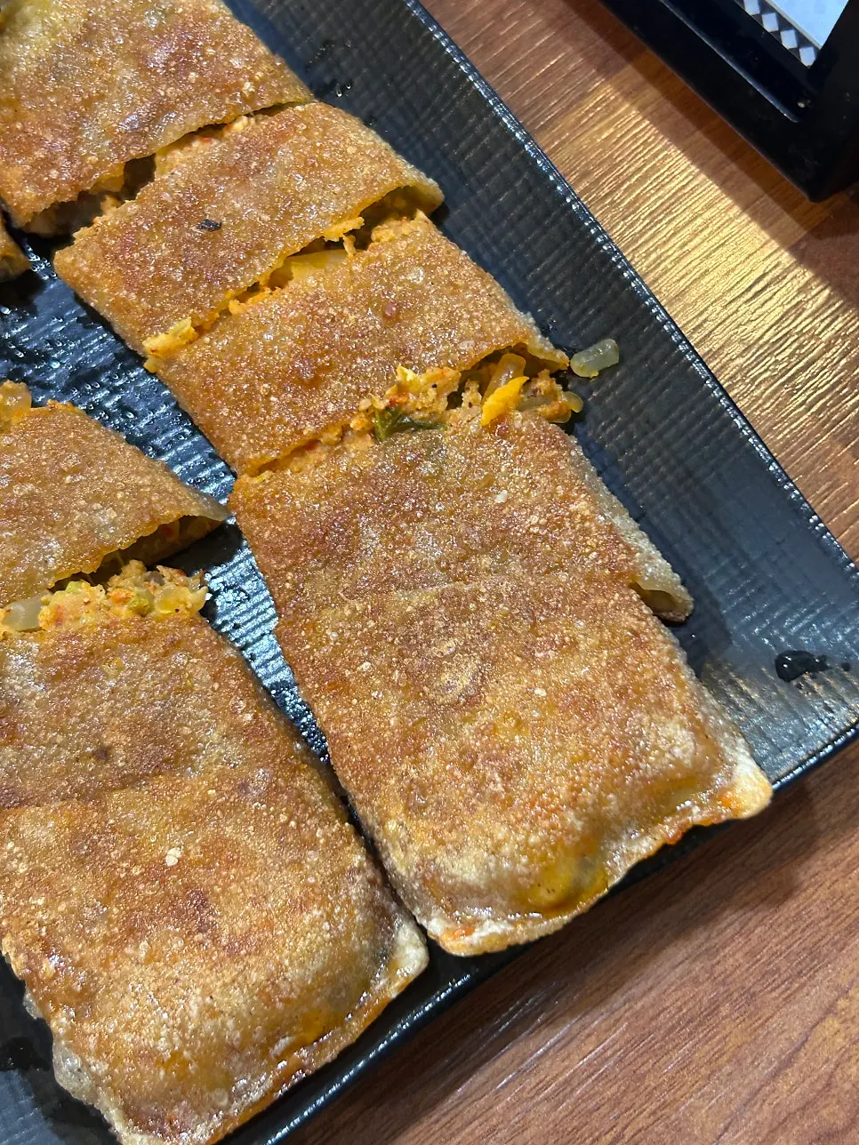 A fully cooked piece of dakgalbi