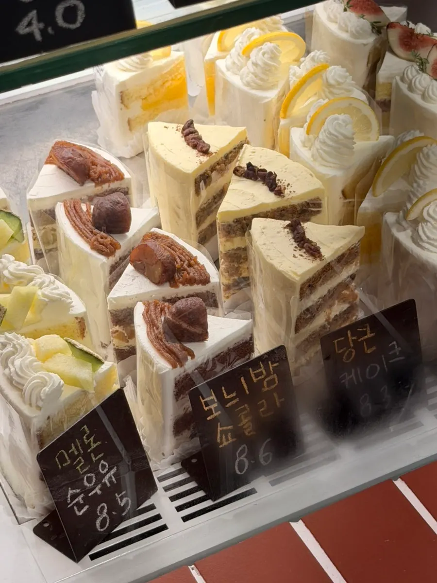 Display case lined with slice cakes