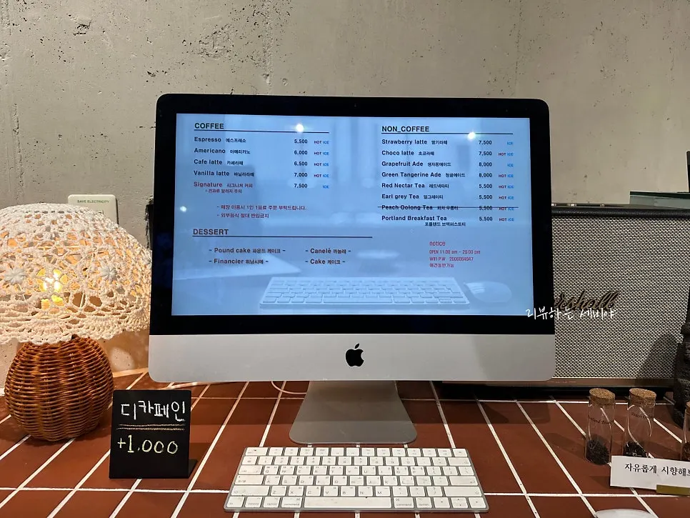 Coffee and drink menu board at Cafe Imchori