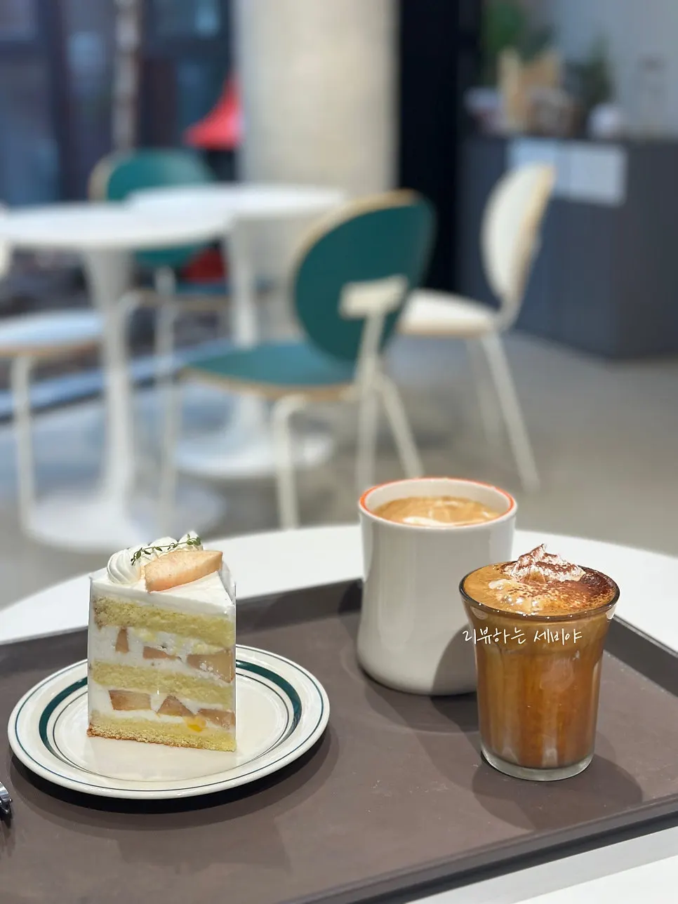 Signature coffee topped with nuts at Cafe Imchori
