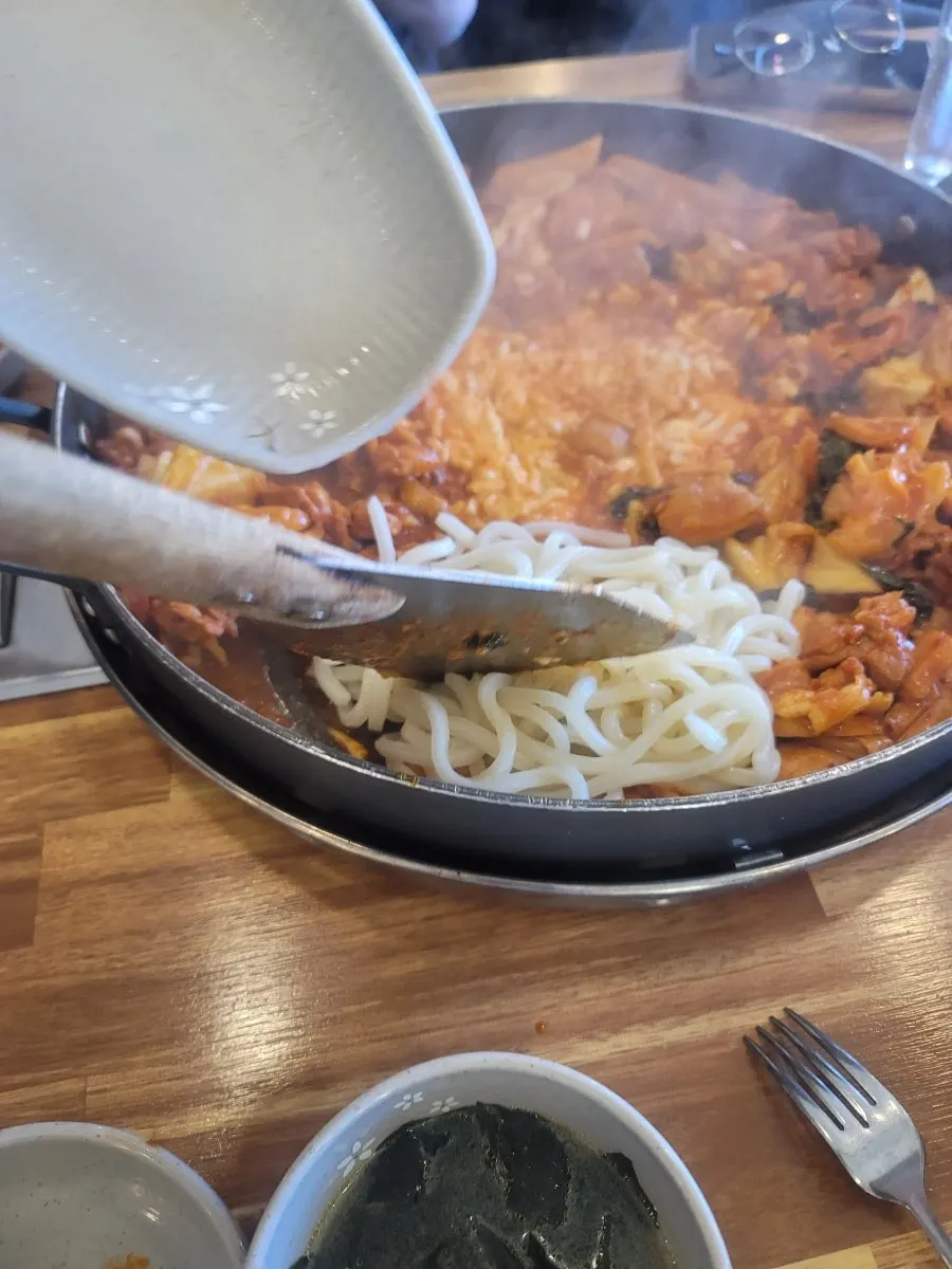 The full spread of hot-plate dakgalbi eaten by our family of three