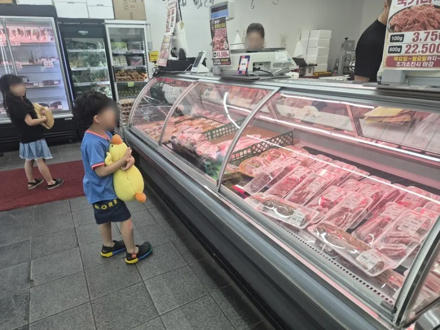 Display of house-made seasoned meat and specialty cuts