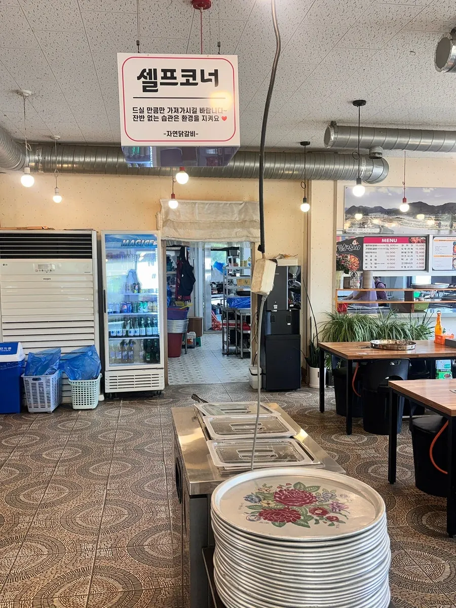 Self-serve side dish bar in the middle of the restaurant
