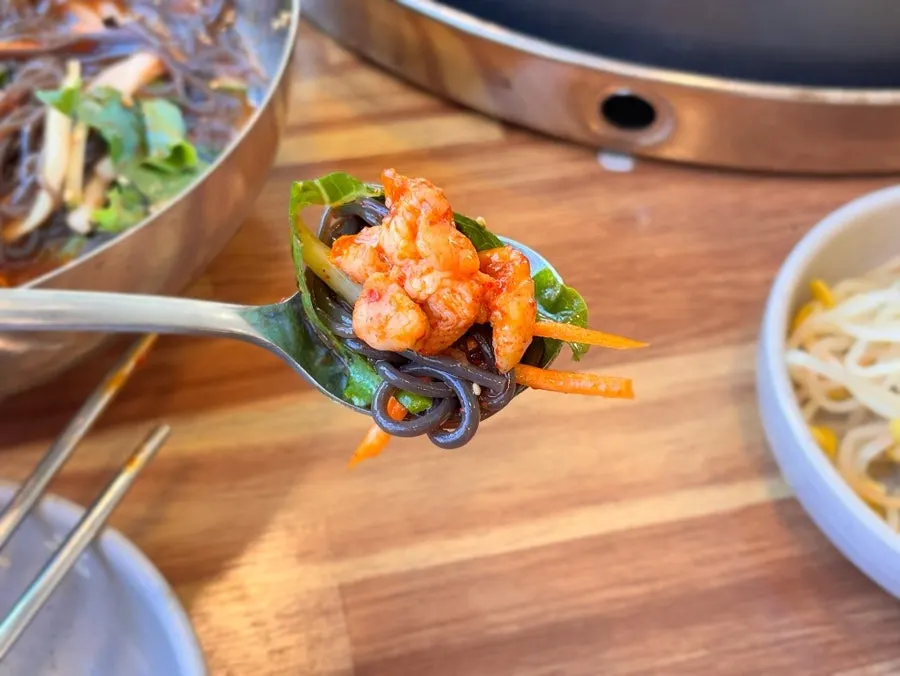 Makguksu served alongside dakgalbi
