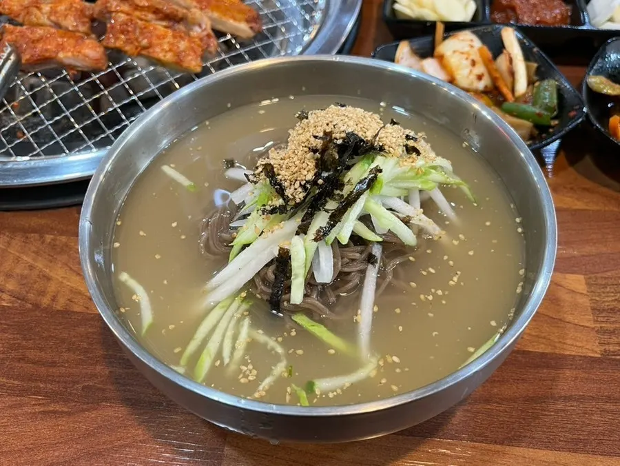 A generously portioned bowl of cold makguksu