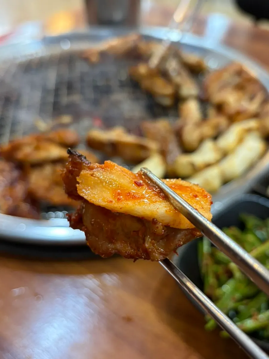 A piece of spicy marinade dakgalbi