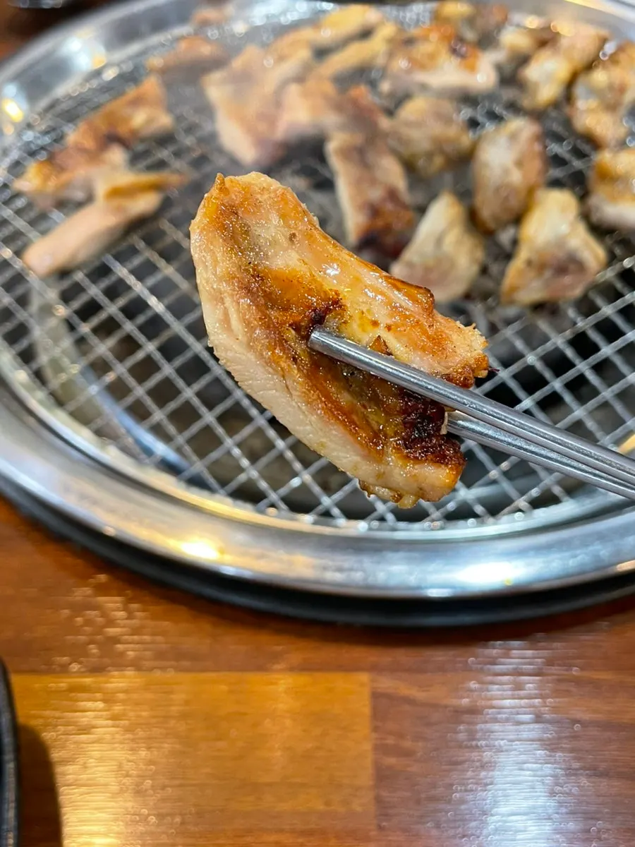 Dakgalbi eaten together with chive salad