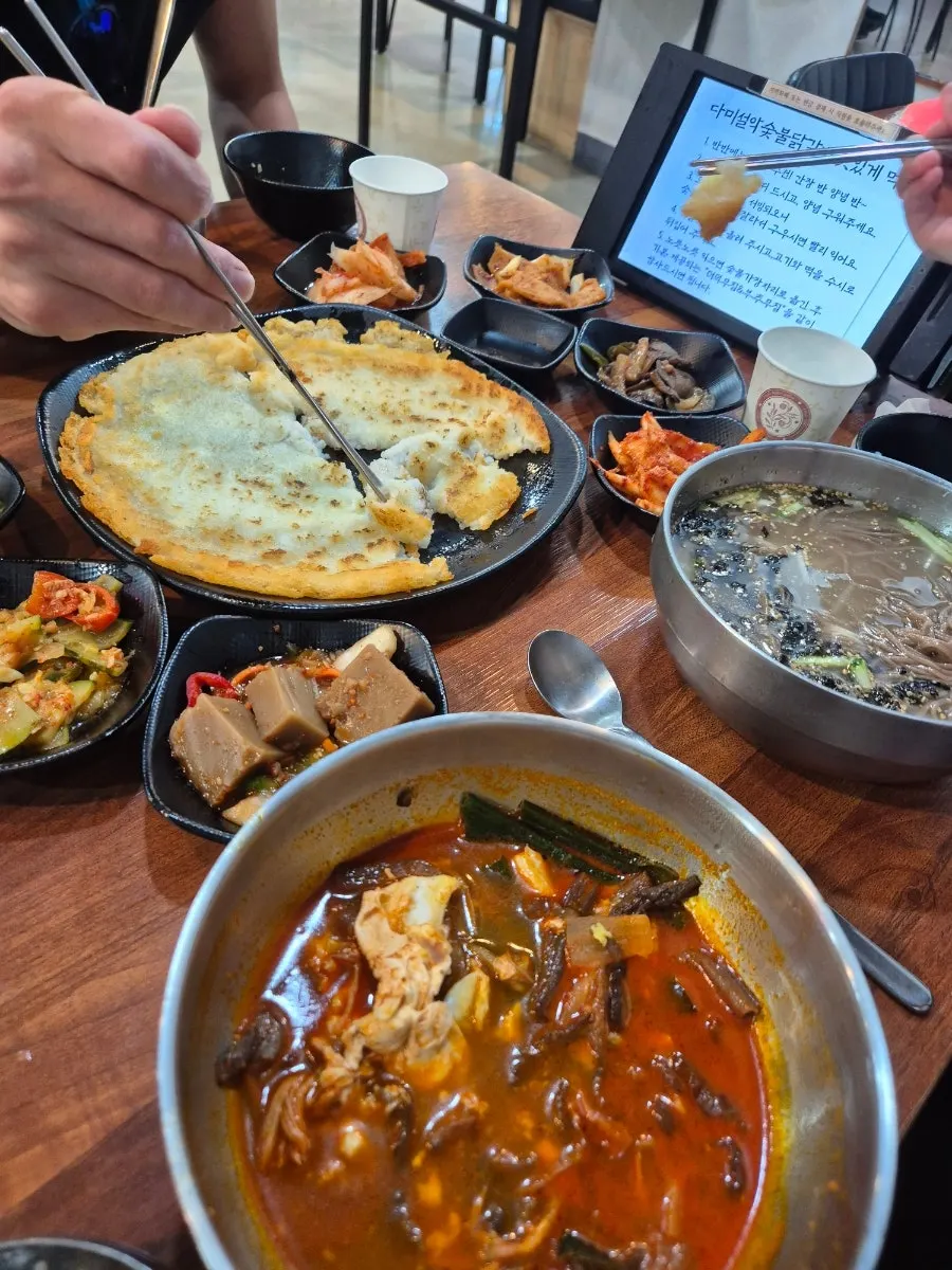 Chopsticks reaching for the gamjajeon