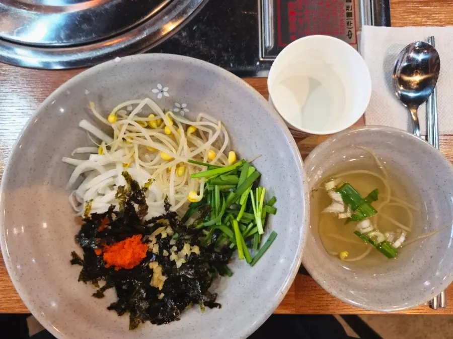 Two grilled octopus rice bowls ordered with regular rice and pot rice