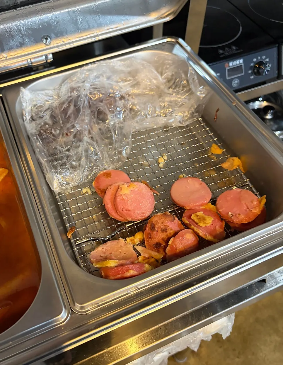 Old-school sausages and other side dishes at the self-bar