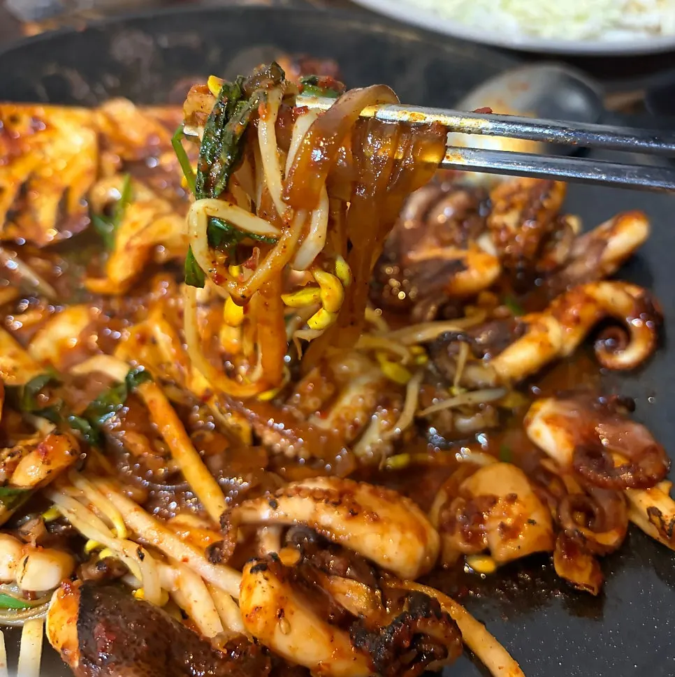Griddle octopus with glass noodles and vegetables