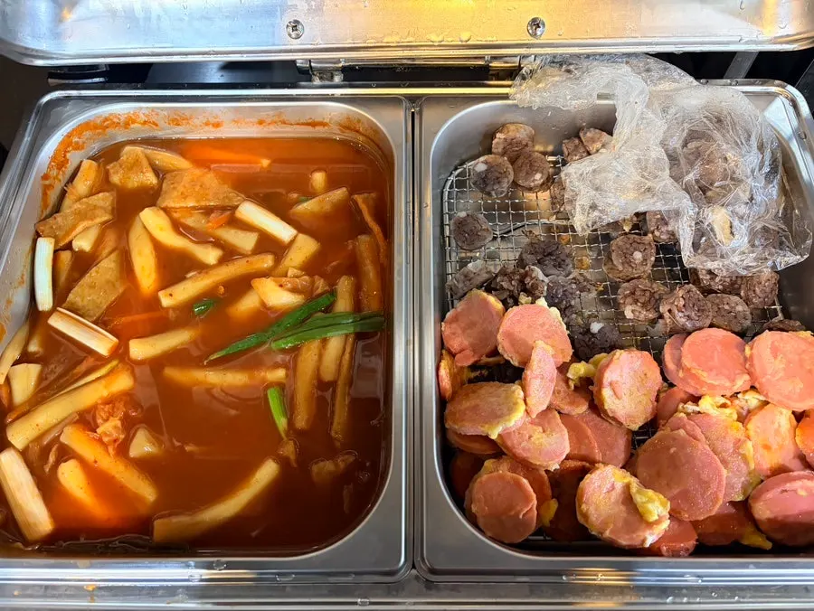 Self-serve buffet corner with tteokbokki and sundae