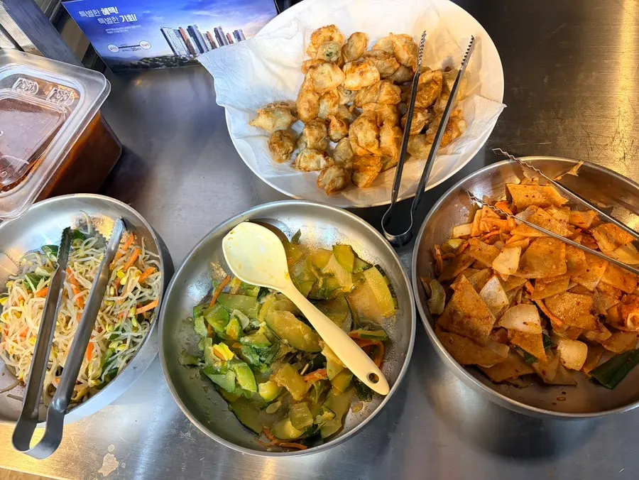 Tray of stir-fried fish cake and sausage at the self-serve buffet