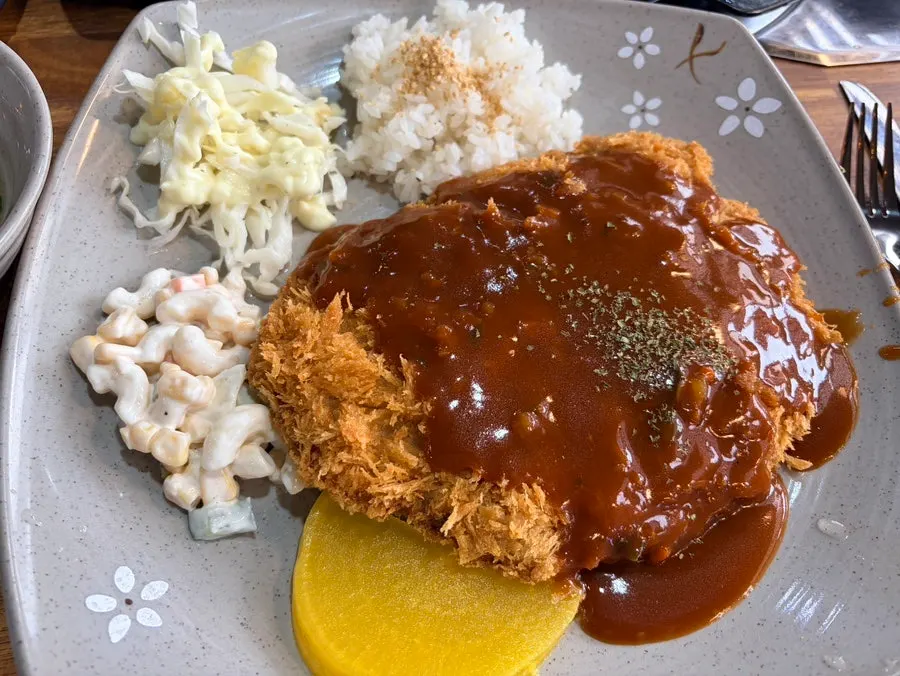 A plate of thick pork loin cutlet