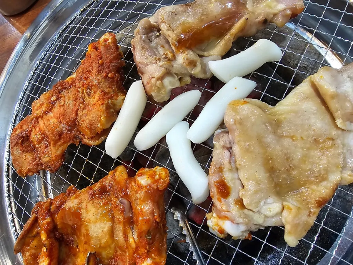 Half soy, half spicy charcoal dakgalbi order
