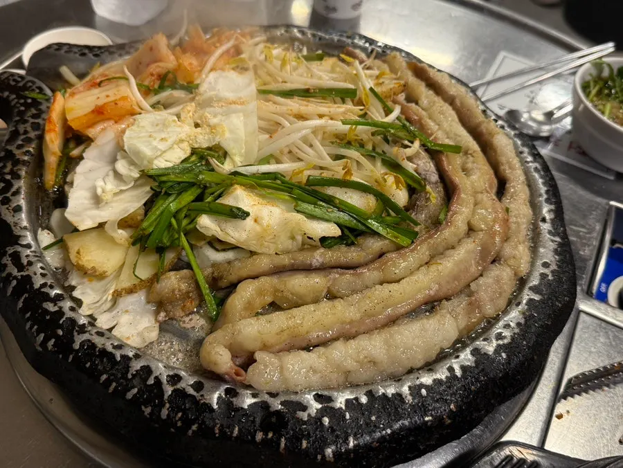 Gopchang cut into pieces by staff