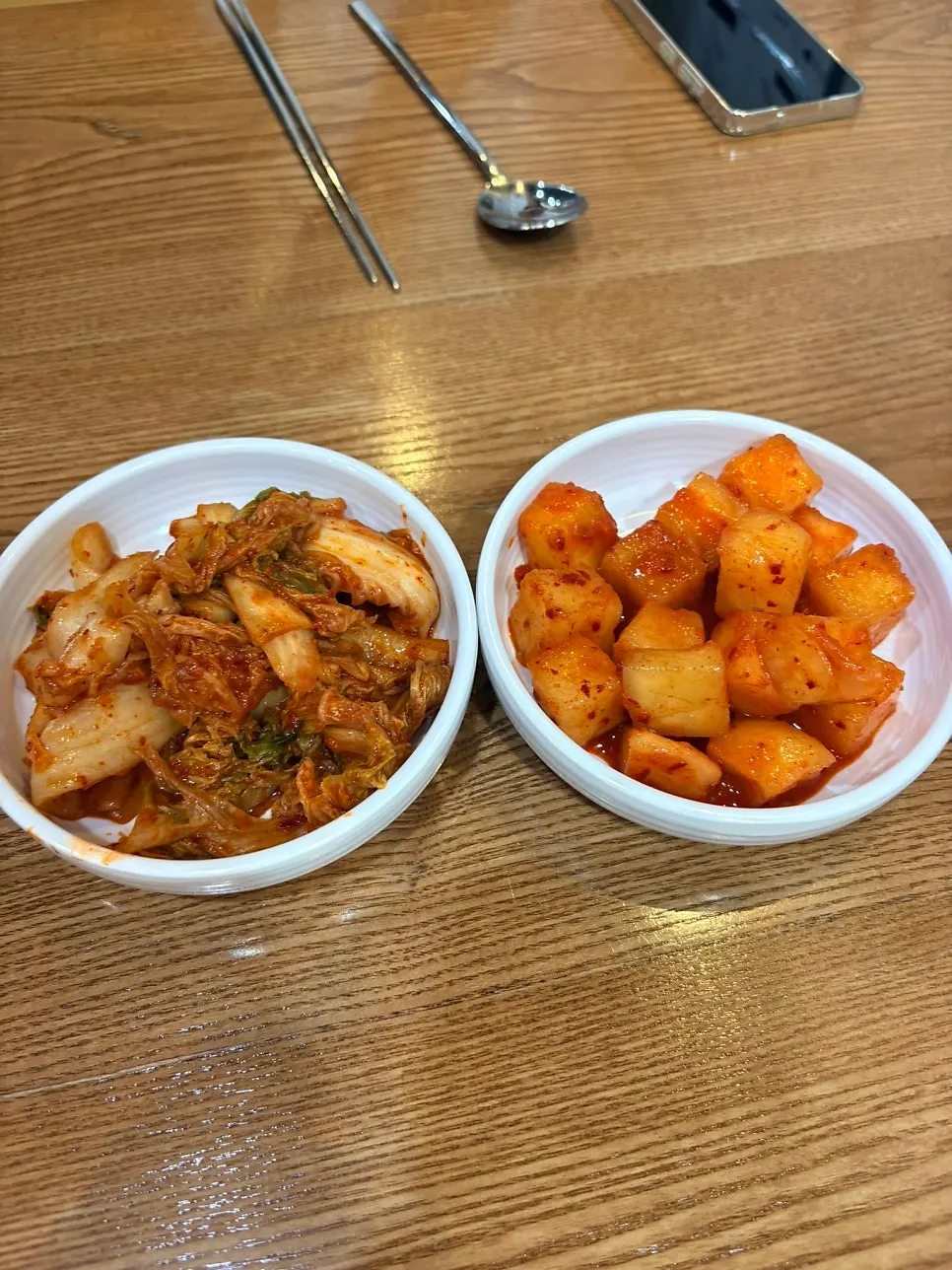Regular kimchi and spicy kimchi, two options