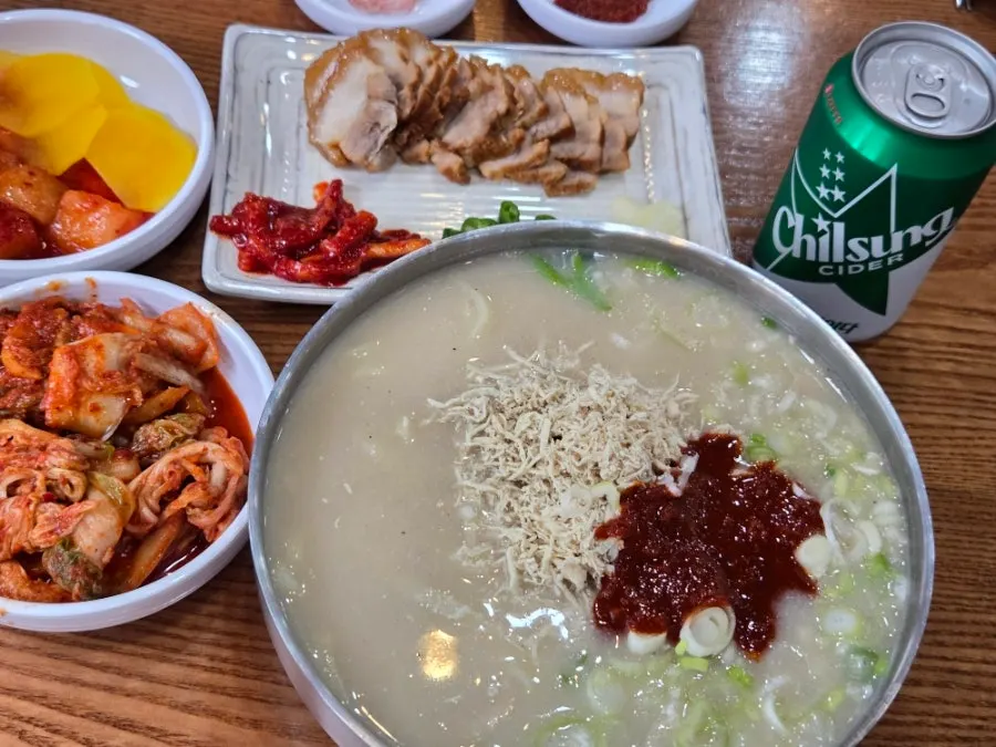 Full table spread of spicy chicken kalguksu at Hanyang Dak Kalguksu Main Branch