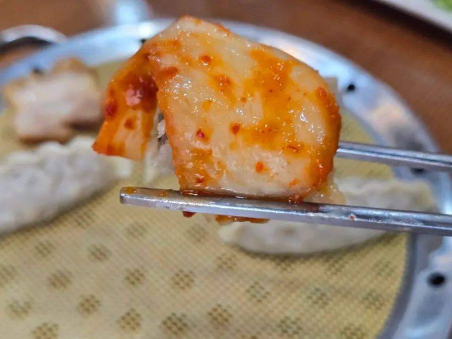 Boiled pork wrapped with spicy kimchi