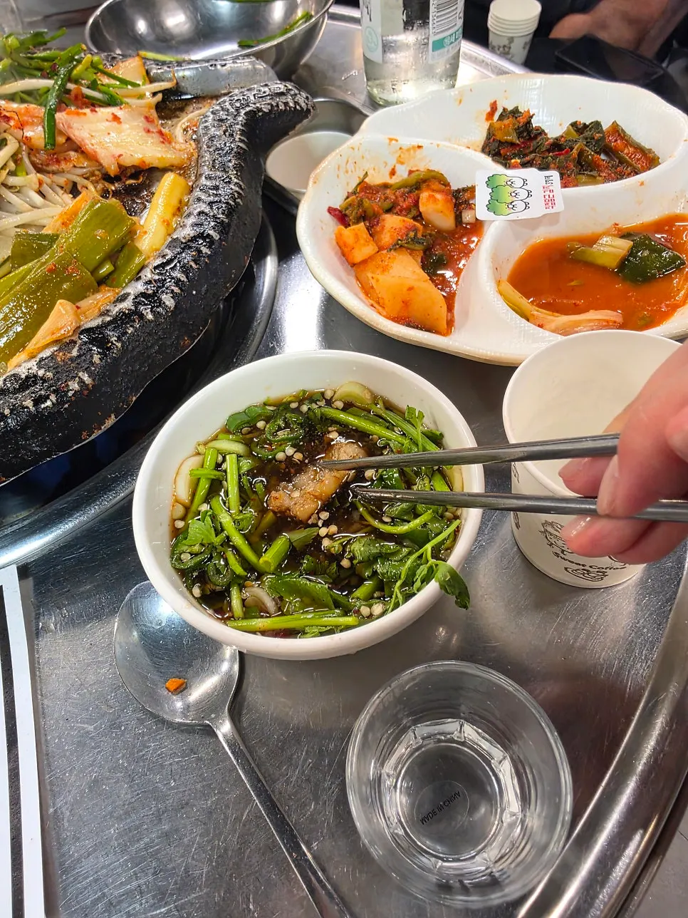 Beef gopchang dipped in sauce