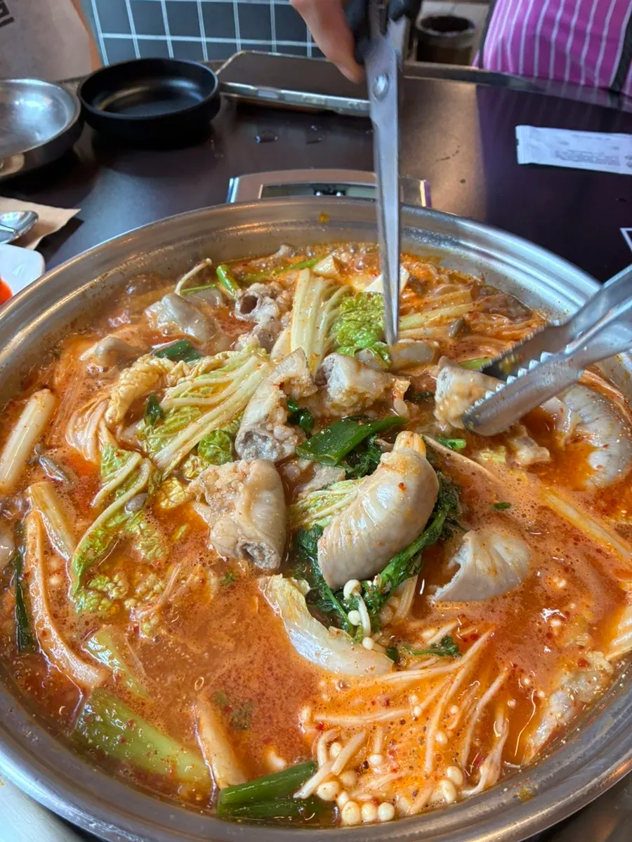Table with gopchang hot pot served