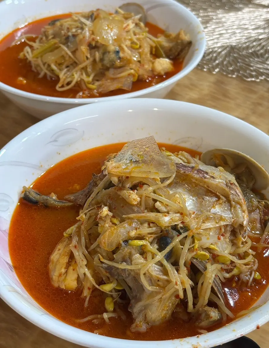 Spicy fish stew with marsh clams and vegetables