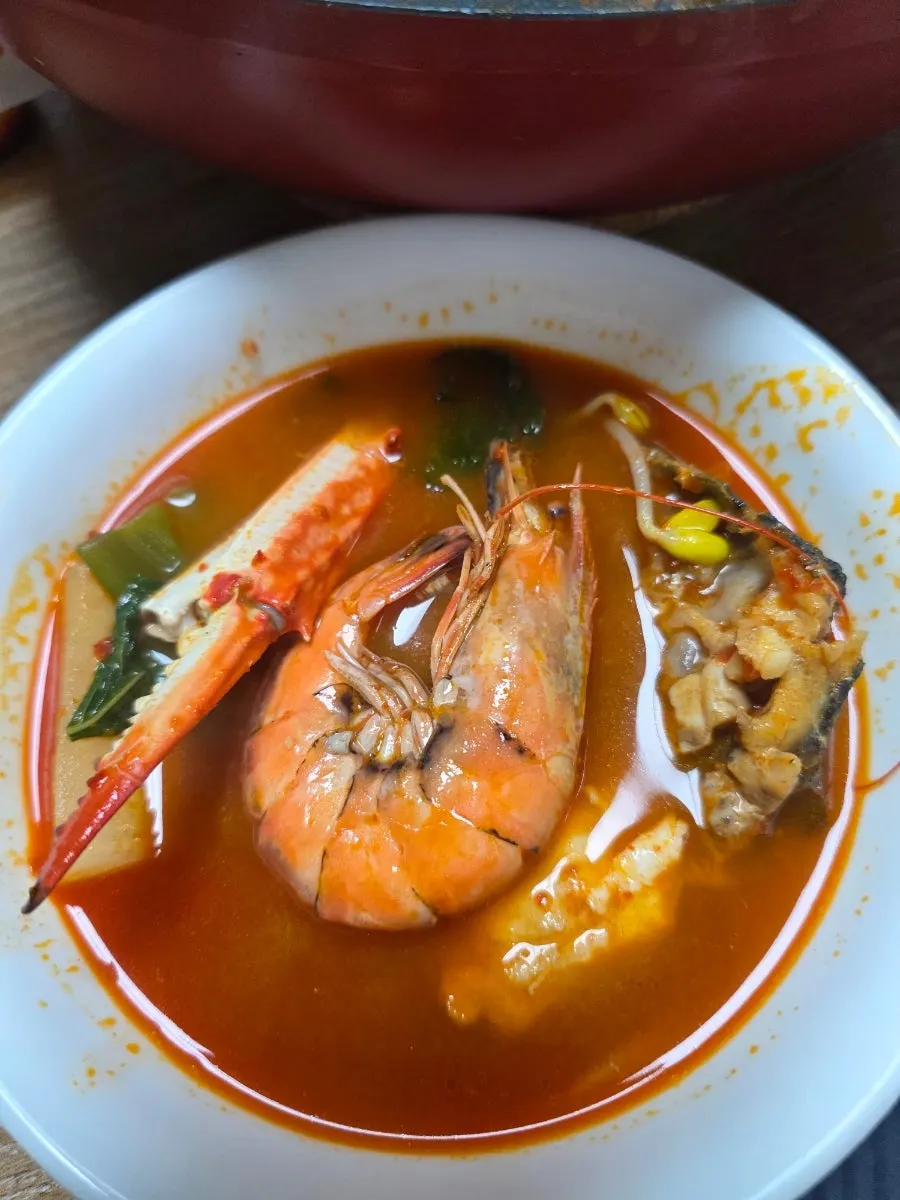 Spicy stew simmered with crab legs