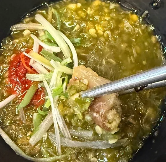 Gopchang dipped in the plum sauce