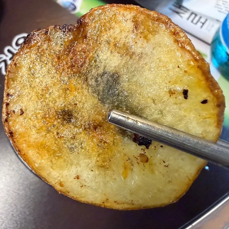 Onion, watercress, and kimchi grilled in gopchang fat