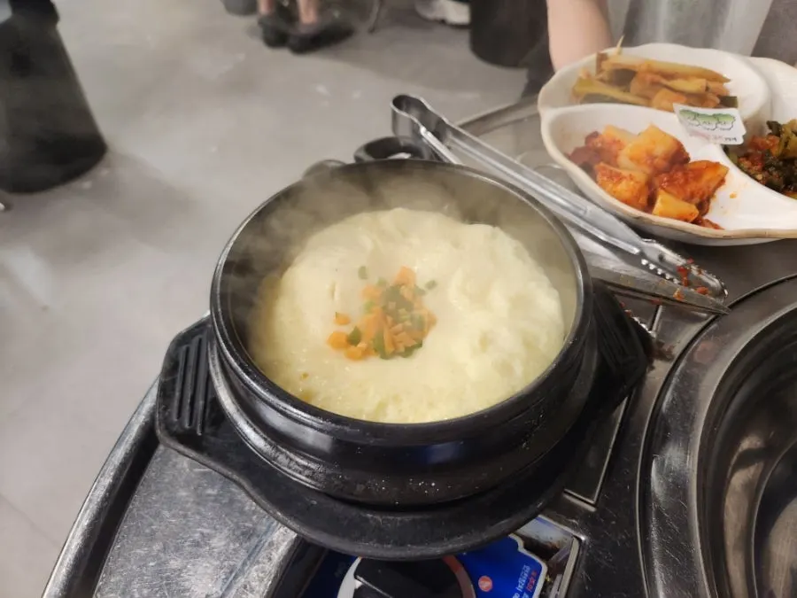 Well-seasoned steamed egg in an earthenware pot
