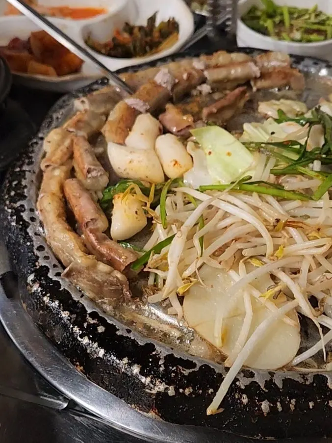 Sliced beef gopchang with fat bursting out