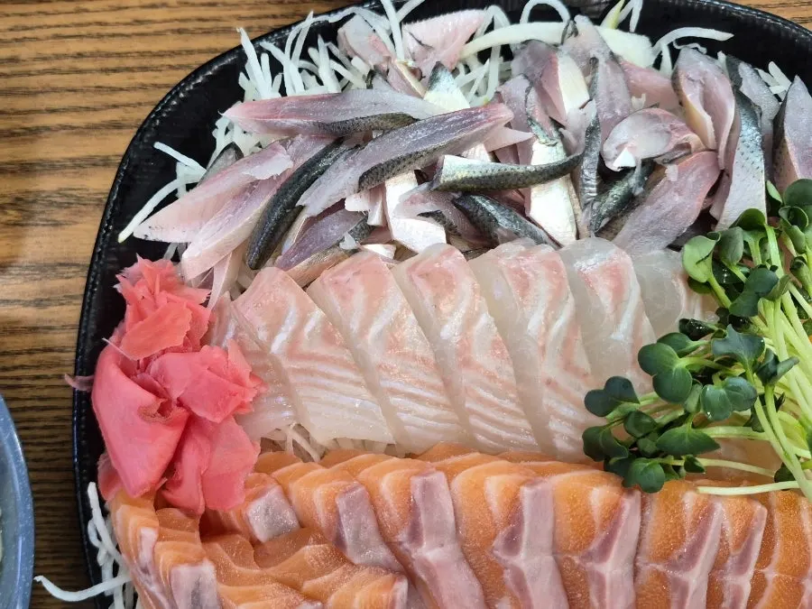 Close-up of large flounder and salmon sashimi