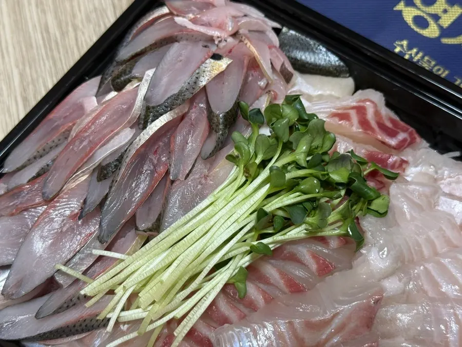 Close-up of nutty gizzard shad sashimi