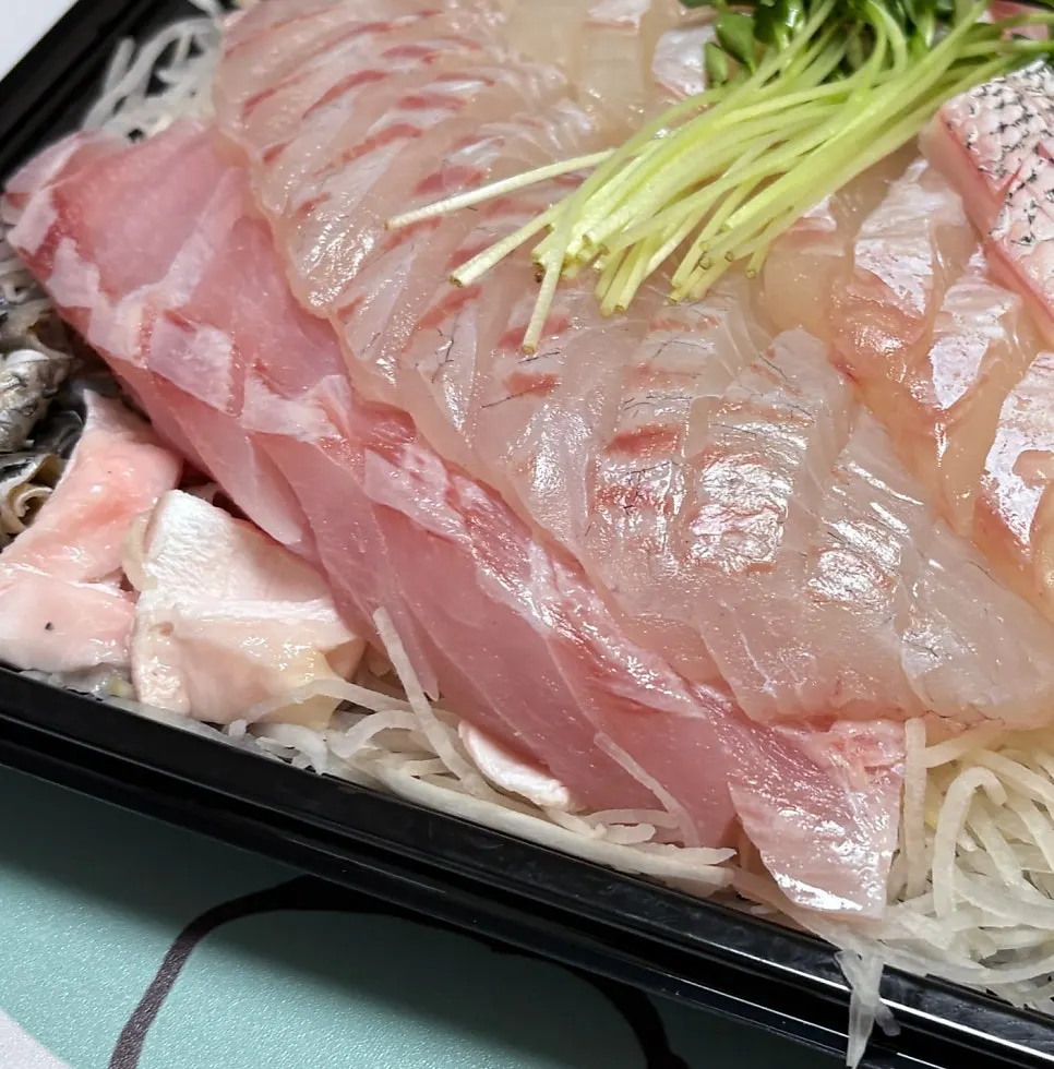 Fish stew ingredients packed along with the sashimi