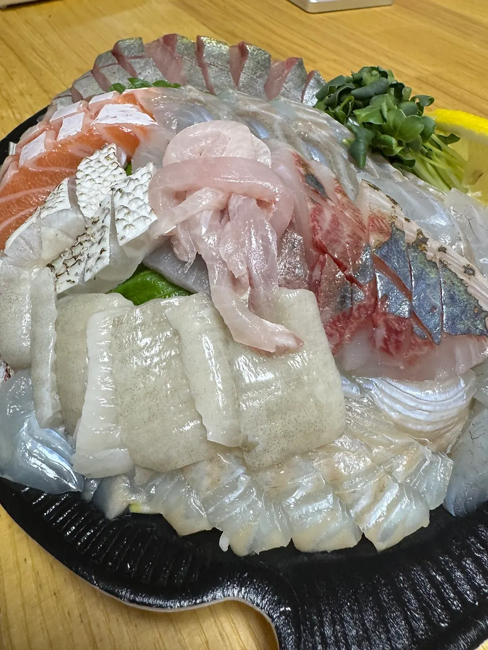 Large flounder sashimi with several fin cuts