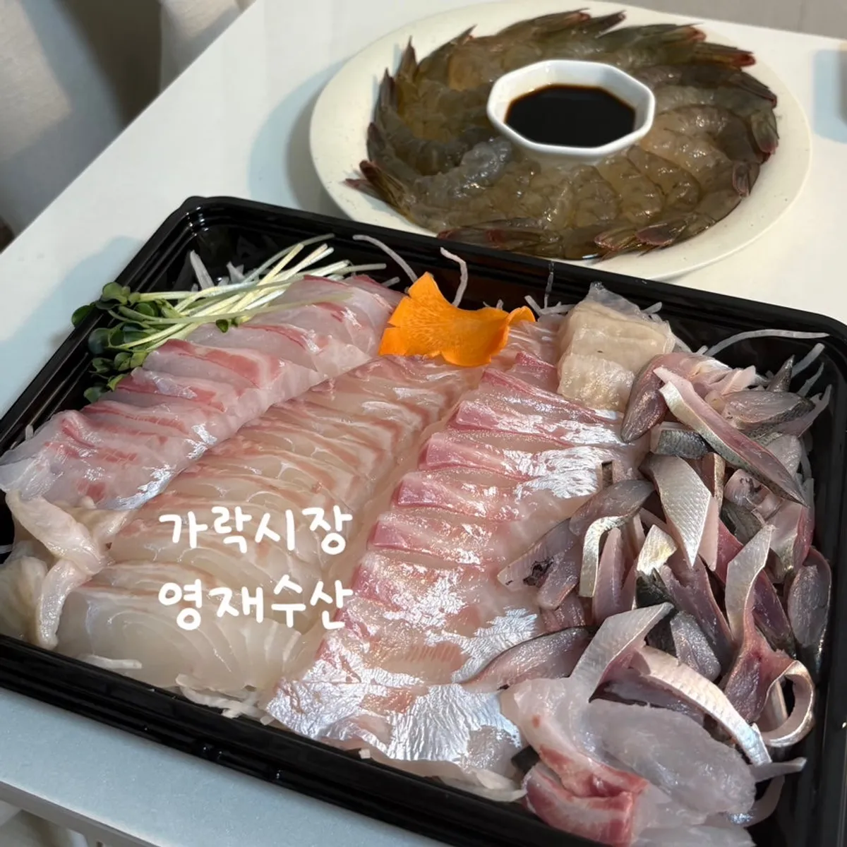 Takeout sashimi and live shrimp from Yeongjae Susan at Garak Market