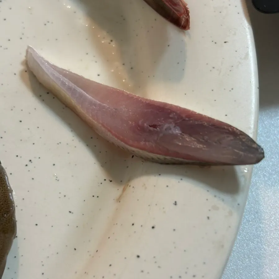Plate of Jeongwang Assorted Sashimi with gizzard shad, flounder, and red seabream