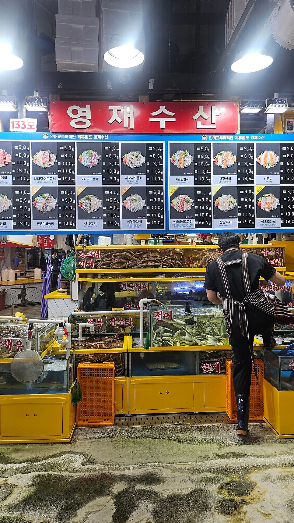 Live fish and seafood in tanks at Yeongjae Susan