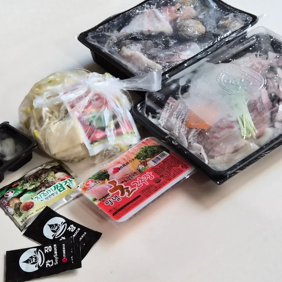 Sashimi package and sides opened up at home