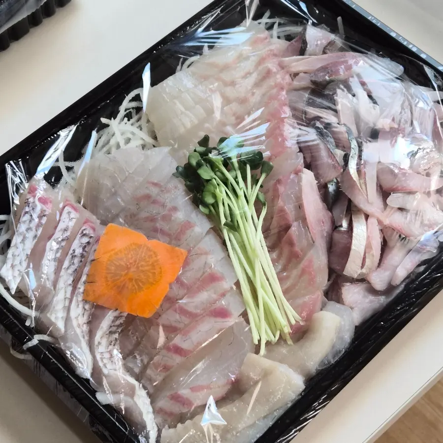 Gizzard shad, flounder, and sea bream sashimi plated at home