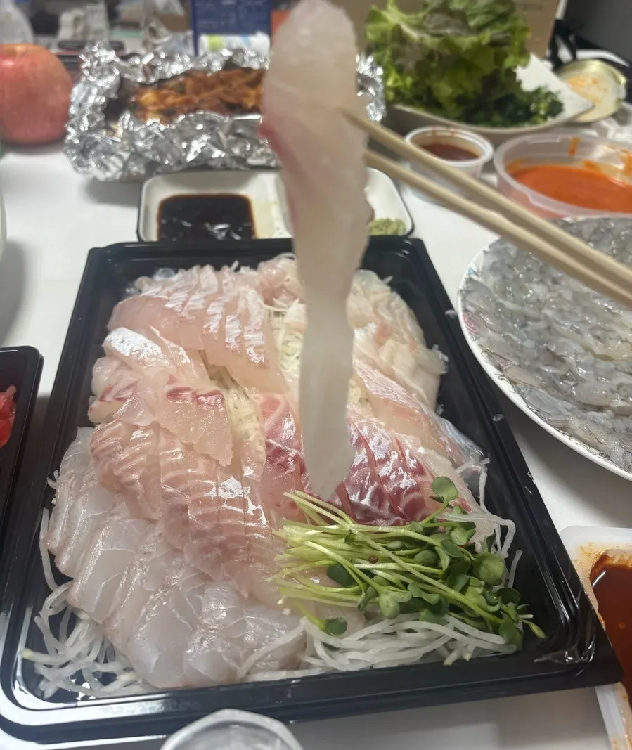 A thick, long slice of sashimi