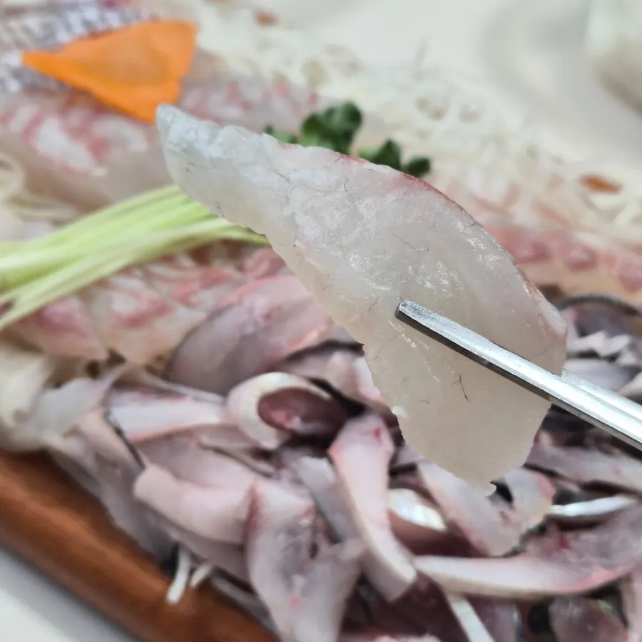 A clean plate of large flounder sashimi