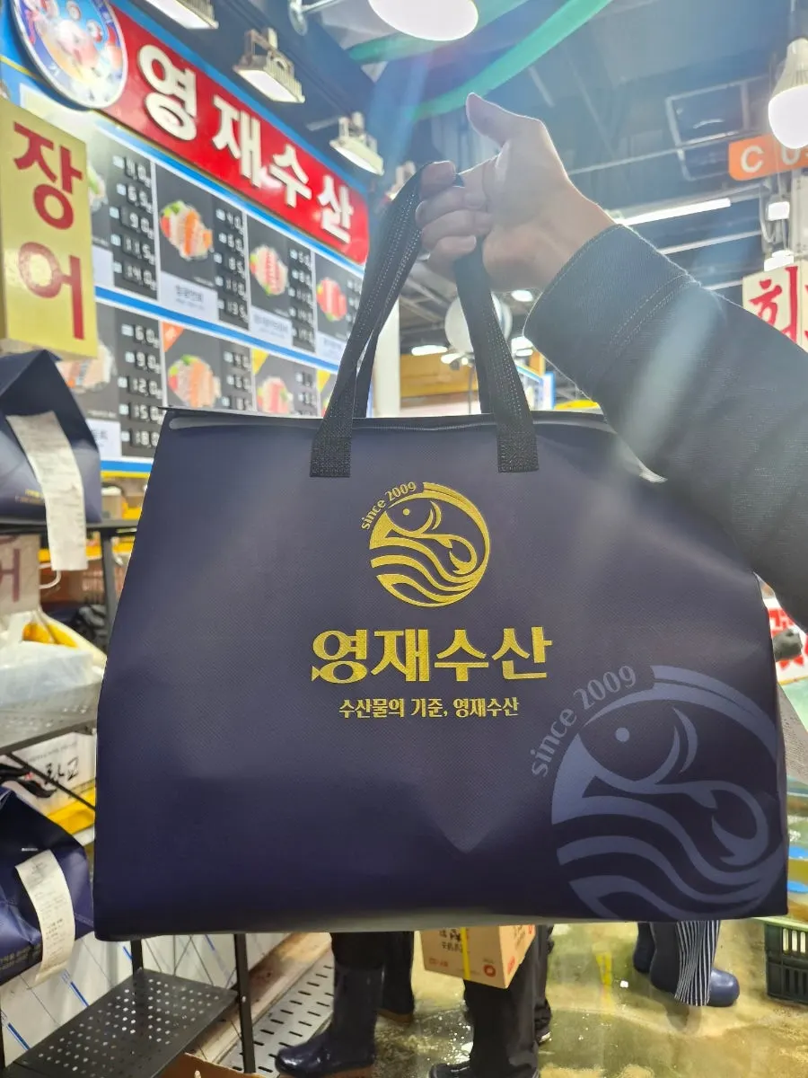 Sashimi packed for takeout in a bag from Yeongjae Susan