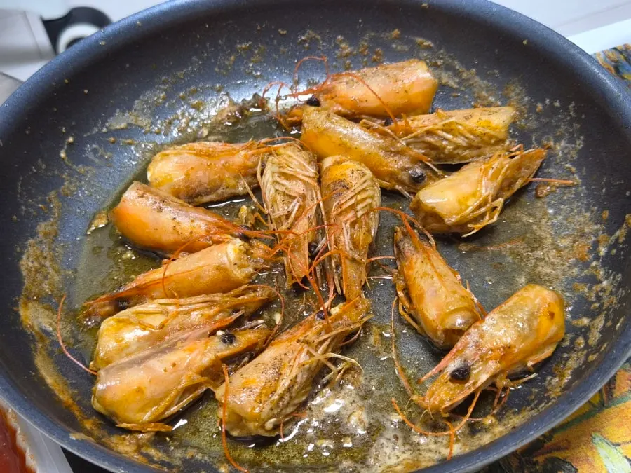 Leftover shrimp heads pan-fried in butter